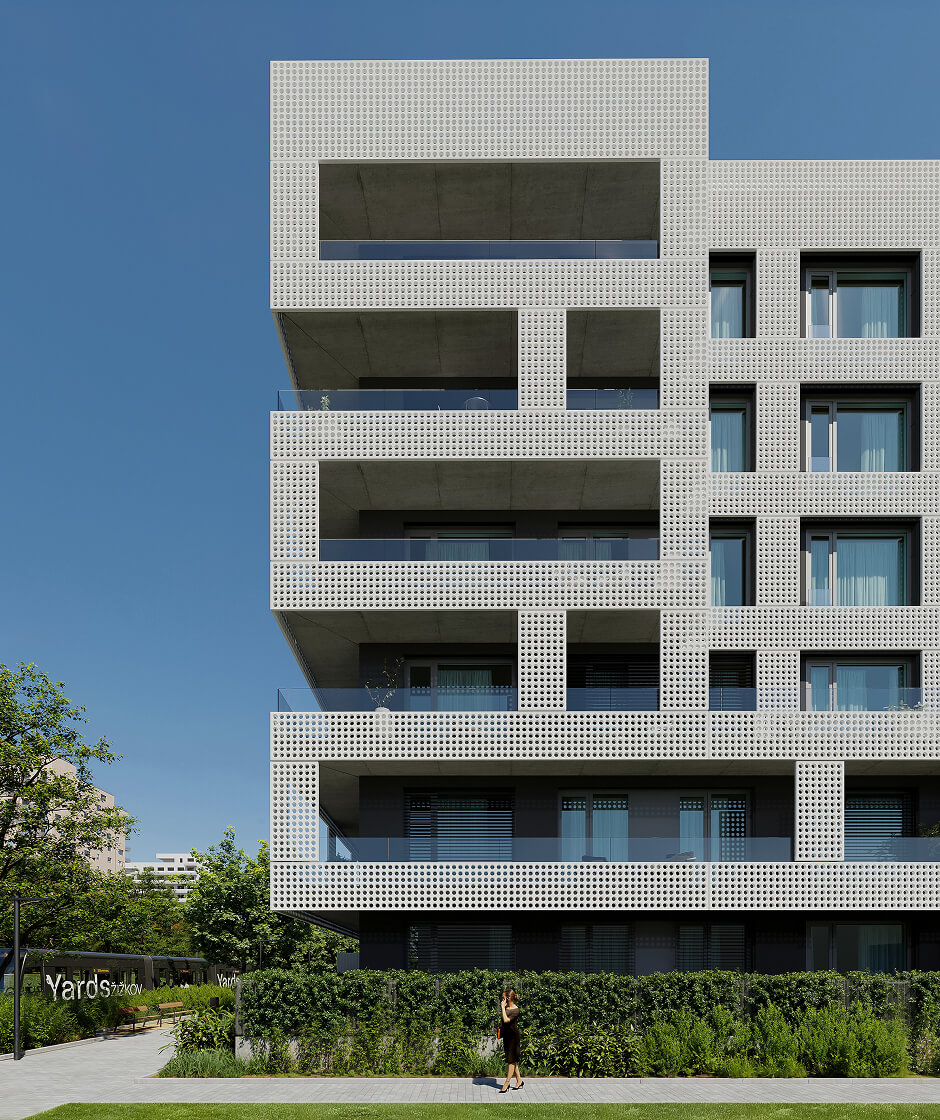 Pohled na novostavbu rezidence Yards Žižkov s designovou fasádou.