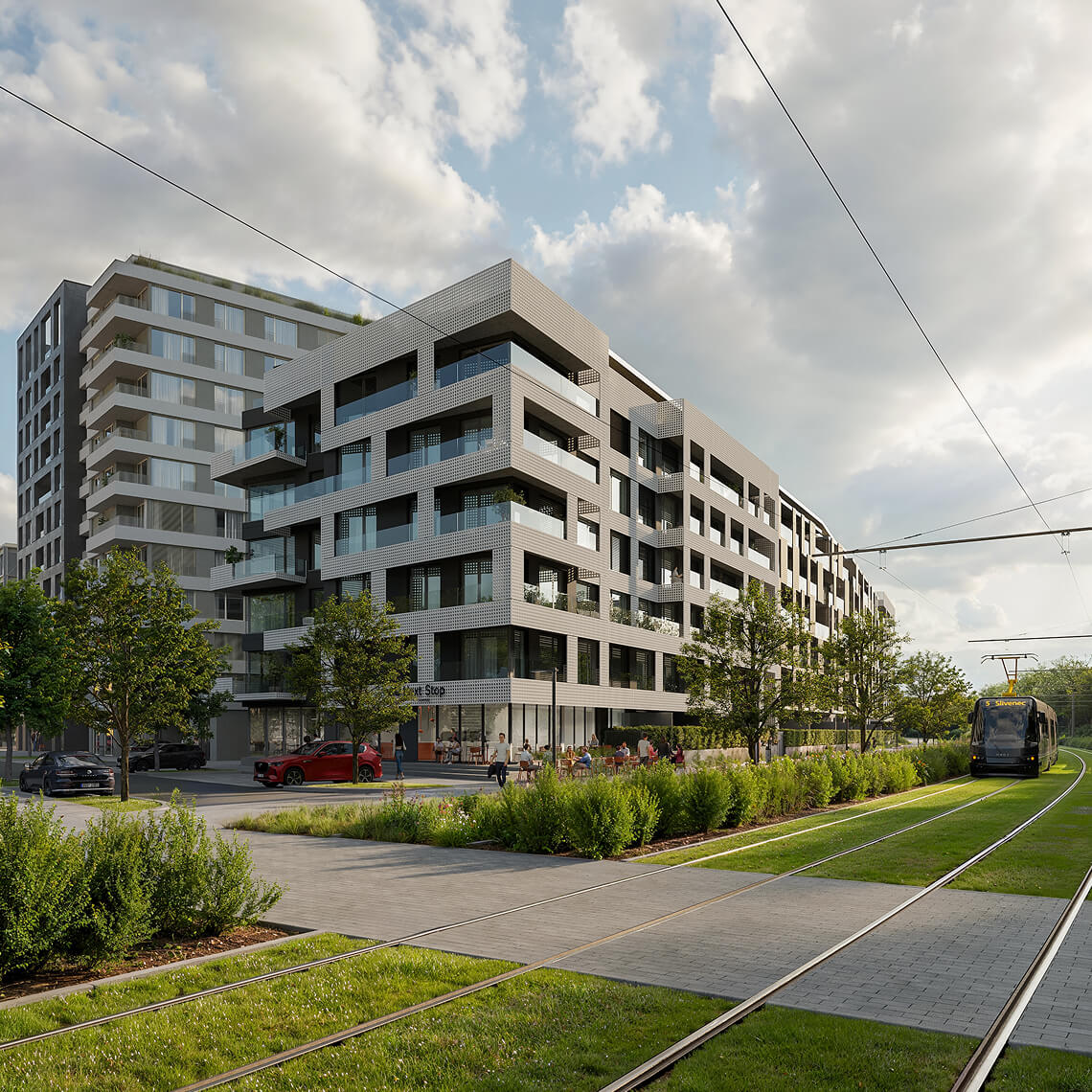 Rezidenční projekt Yards Žižkov s tramvajovou tratí v popředí.